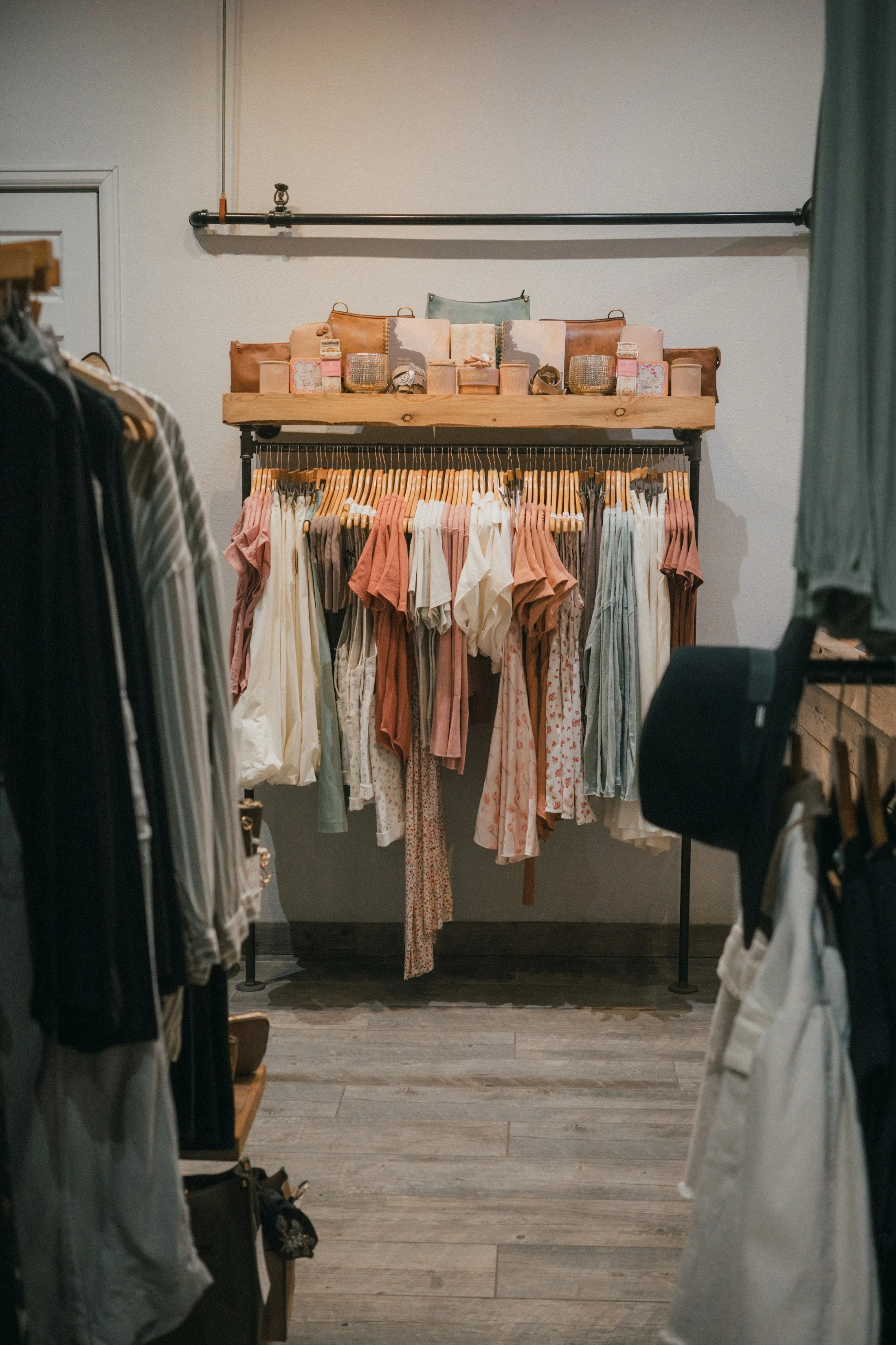 Racks of women's clothing displayed in a boutique